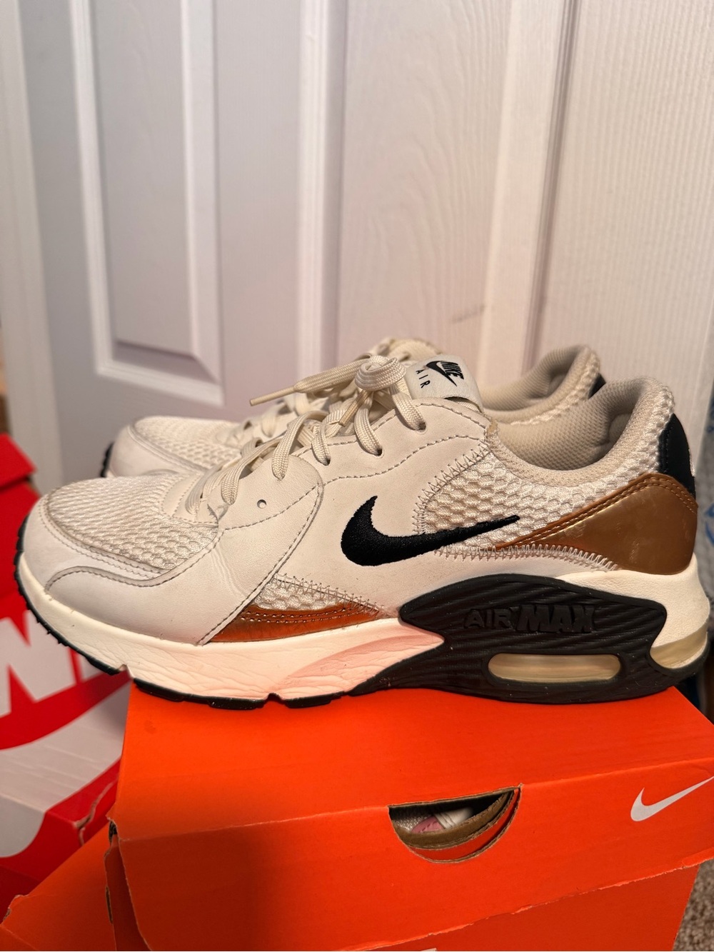 Nike Women's Cream Lace-Up Running Sneakers